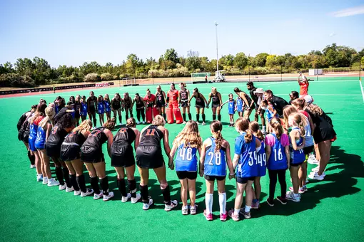 Field Hockey Huddles With Youths