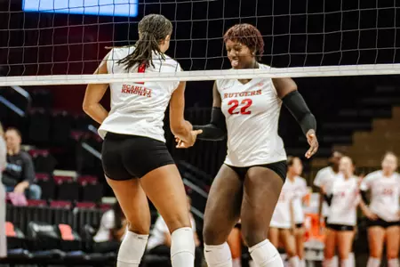 Tara Garvey and Zora Hardison celebrate against Columbia in Rutgers volleyball's nonconference finale