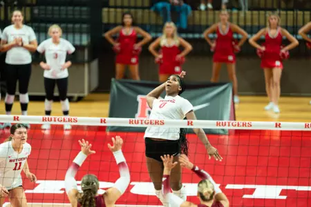 Aspen Maxwell on the attack in Rutgers volleyball's home opening win over Rider