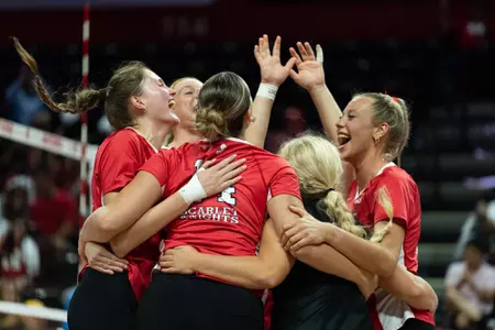 Rutgers volleyball celebrates during its match with Rider at Jersey Mike's Arena