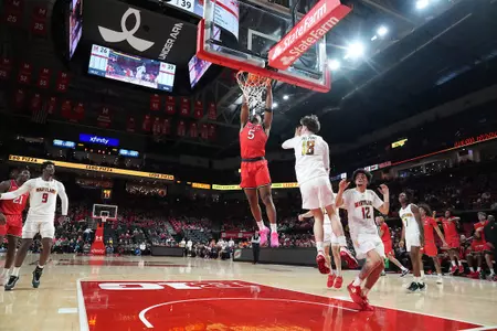 View game action images from Rutgers men's basketball's game at Maryland.