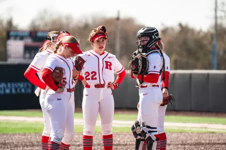 Rutgers softball's infield talks in the circle during the series finale with Penn State at the RU Softball Complex