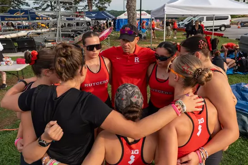 Rutgers women's rowing huddles prior to the start of the 2026 NCAA Championships
