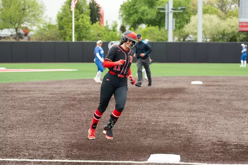 Mia Mitchell approaches third after a home run against Seton Hall at the RU Softball Complex