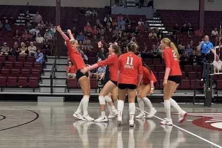 Karis Willow celebrates after serving up her seventh ace for match point in the win over Bellarmine