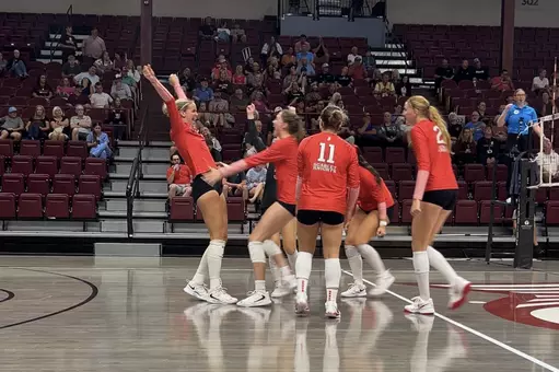Karis Willow celebrates after serving up her seventh ace for match point in the win over Bellarmine