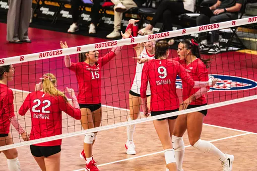 Rutgers volleyball celebrates a point during its Stony Brook match at Jersey Mike's Arena