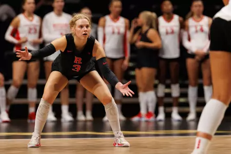Kenzie Dyrstad prepares to recieve the ball against Vanderbilt at Memorial Gymnasium during the Big Ten/SEC Challenge