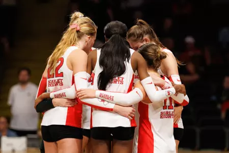 Rutgers volleyball huddles against Vanderbilt at Memorial Gymnasium