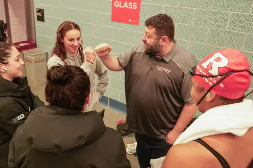 Rutgers Swimming Coach Jon Maccol with Swimmer Anna Vlachou