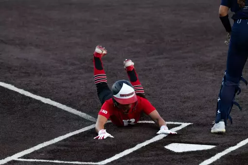 Rutgers softball sliding into home during its fall ball contest vs Monmouth at the RU Softball Complex