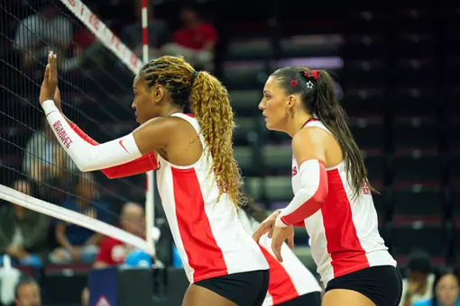 Zharia Harris-Waddy and Skylar George at the net in the Rutgers volleyball home opener vs. LIU at Jersey Mike's Arena