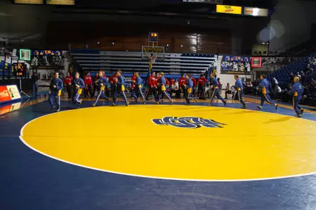 Wrestling adds two...
