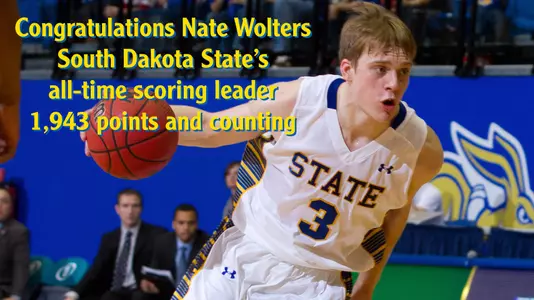 Scoring record falls in 74-71 loss