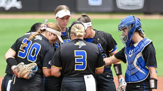 Softball team huddle