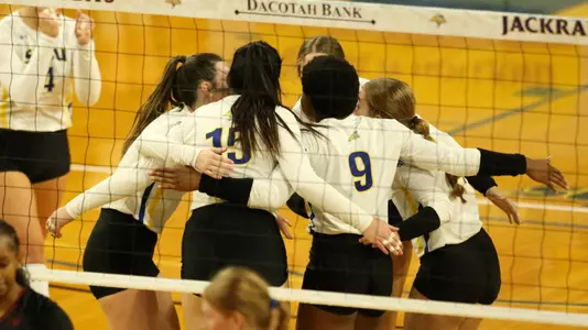 Volleyball team huddle