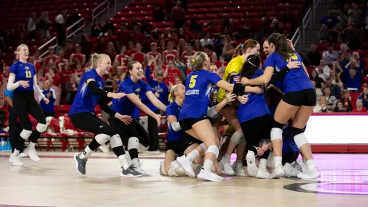 Volleyball team celebration at USD