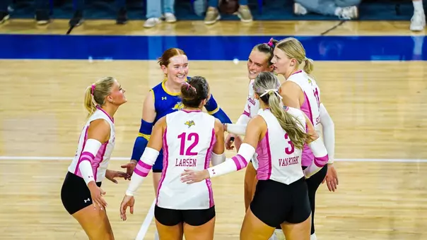 Volleyball team celebration 102325