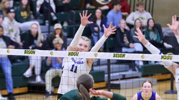 Sydni Schetnan defends at the net against a North Dakota State attacker