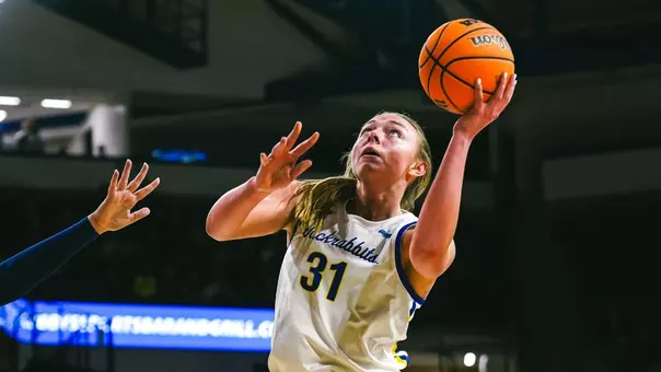 Brooklyn Meyer attempts a layup during a South Dakota State women's basketball game
