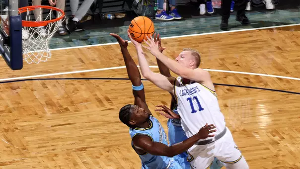 Matthew Mors goes for a shot through a defender