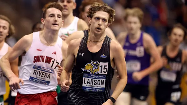 Cody Larson running at the Summit League Indoor Championships in Brookings in 2025