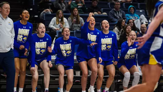 Women's basketball bench celebration