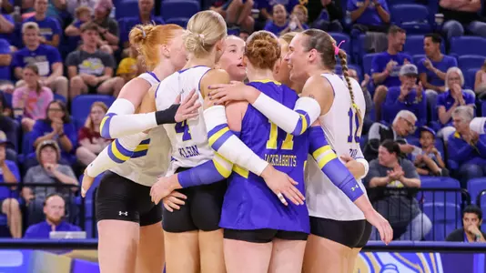 SDSU volleyball team huddle