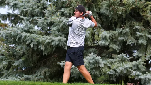 Jake Olson teeing off