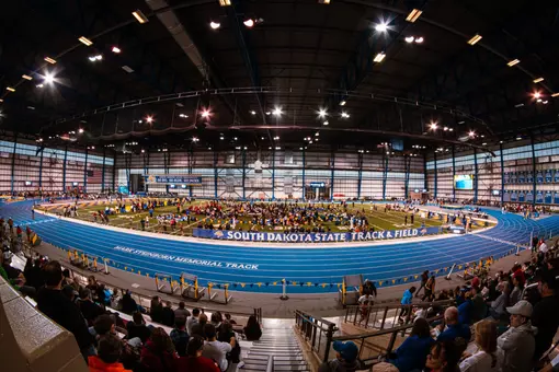 Wide facility shot of an indoor track and field facility - the Sanford Jackrabbit Athletic Complex