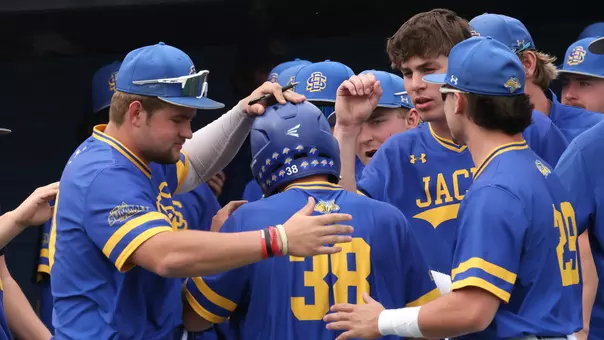 South Dakota State baseball players congratulate Owen Siegert after he hit a home run in a game versus Omaha on April 12, 2025.
