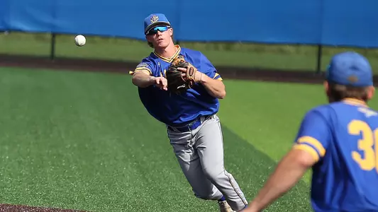 South Dakota State infielder Travis Finney throws a ball to first base during a fall exhibition game.