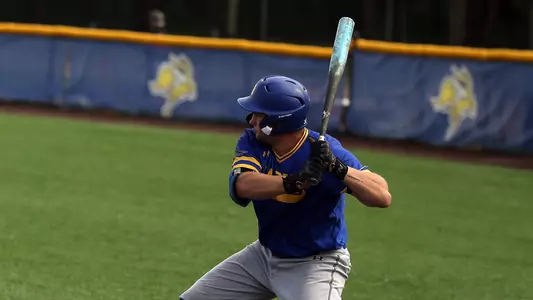 Dayton Franke eyes a pitch during exhibition action in the fall of 2025 at Erv Huether Field in Brookings, South Dakota.
