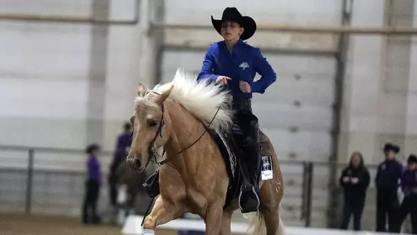 Emma Riggs competes in reining during equestrian competition Feb. 6, 2026, against TCU. Riggs earned Most Outstanding Performer honors.