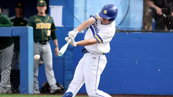 South Dakota State third baseman Nolan Grawe lines a single to right field during action March 20, 2026, against North Dakota State at Erv Huether Field.