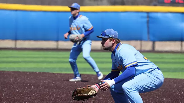 South Dakota State first baseman Dayton Franke (foreground) and second Nic Werk move into defensive position as they await a pitch being thrown in home action against Oral Roberts at Erv Huether Field.