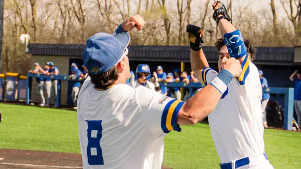 South Dakota State baseball players Brady Brown (left) and Luke Evenson celebrate one of Evenson's two home runs in the Jackrabbits' 15-6 victory over Briar Cliff on April 22, 2026, at Erv Huether Field in Brookings, South Dakota.