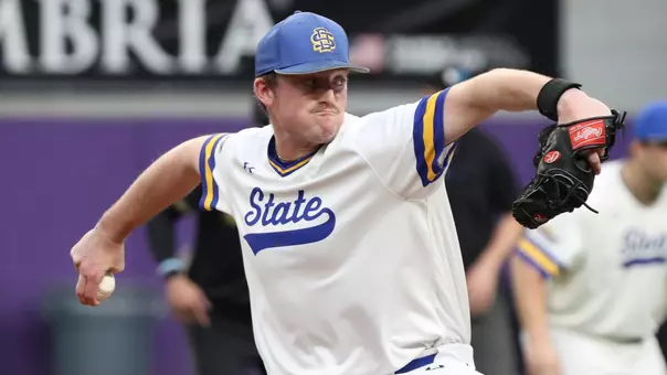 Drew McDowell eyes home plate as he goes through his windup and motion in action against Northwestern (Ill.) at the Cambria Classic in Minneapolis, Minnesota, during the 2026 season.