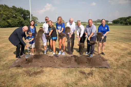 Individuals throw dirt into the air signifying ground being broken Dakota Layers Stadium, the future home of South Dakota State soccer