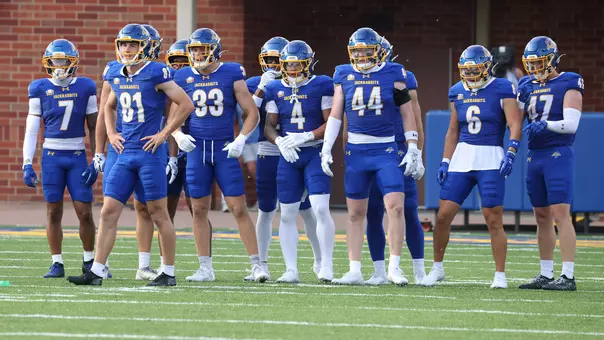 South Dakota State football players await the opening kickoff in action against Stetson on Aug. 29, 2026, at Dana J. Dykhouse Stadium.