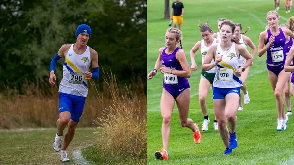 Side-by-side action photos of South Dakota State cross country runners during competition. On the left, a Jackrabbit runner wearing a white and blue uniform, blue beanie, and bib number 296 rounds a bend on a grass course bordered by tall vegetation and trees. On the right, a Jackrabbit runner in a white and blue uniform with bib number 970 runs among a pack of competitors on a grassy course, including athletes in purple and green uniforms. Both images capture athletes competing in outdoor cross country races.