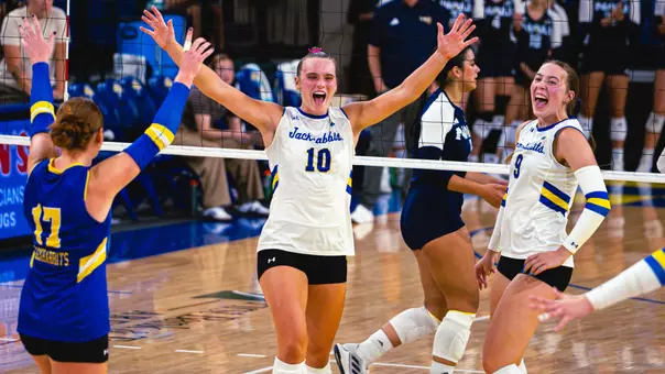 Sylvie Zgonc celebrates with her teammates after a point.