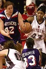 Tami Rater (42) and Chaquita Dilworth (33) and Rutgers Tasha Pointer (43) and Dana Boonen scramble for a loose ball in the first half of the NCAA tournament first round game.