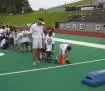 Coach Todd Ivivic helps at the Youth Clinic Saturday at Homer Bryce Stadium.