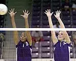 Amelia Mayeaux and Brittany Burton go up for a block.