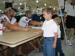 Captains Matt Hoelscher and Matt Bodley sign autographs for local youngsters at Wal-Mart