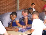 SFA football players will be at Wal-Mart Saturday to sign autographs