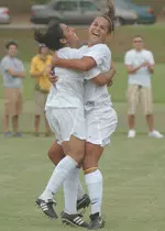 Shahin Pabani, left, celebrates a goal with Amanda Alders Sunday in SFA's 4-1 win over Grambling State