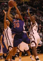 Freshman Antoinette Davis scores eight points and grabs eight boards against NSU.