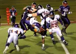 Junior Duane Brooks fights for extra yardage in the first quarter against Northwestern State.